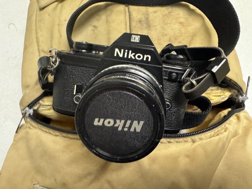 Nikon EM 35mm SLR Film Camera With 50mm Lens Plus 52mm Filter & Extra Lens & Bag